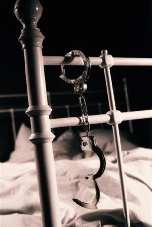 esposas_cama_310x463